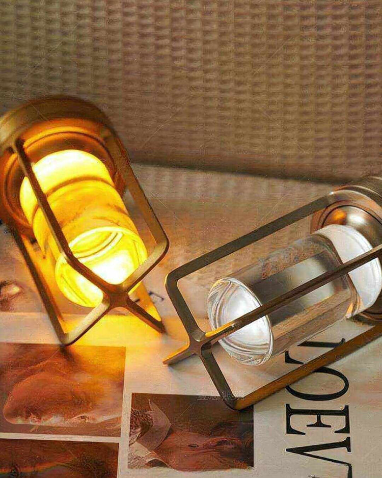 LumiHikari Crystal Lantern Lamp with faceted glass body emitting warm glowing light, showcasing minimalist metal frame design.