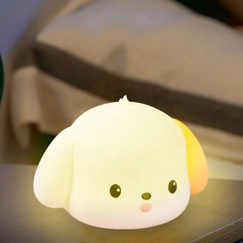 Spotted Puppy Night Light in soft silicone emitting warm cozy glow