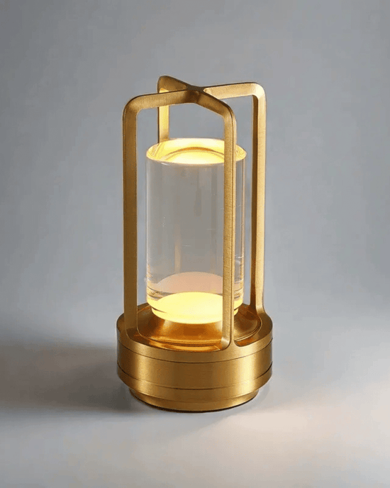 LumiHikari Crystal Lantern Lamp with faceted crystal body, gold aviation-grade aluminum frame, soft glowing light, cordless USB-C rechargeable, minimalist Japanese-inspired design.