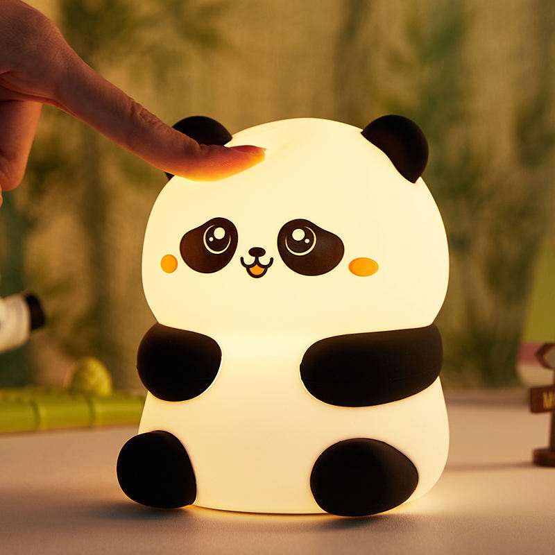 Cute panda night light LED squishy tap lamp glowing warm white with black ears and paws